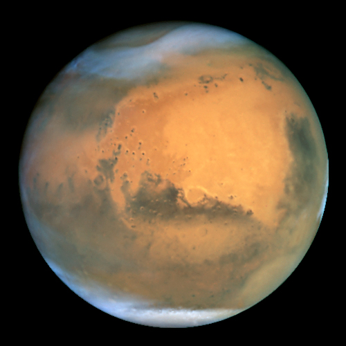 "Mars Hubble" by NASA and The Hubble Heritage Team. Licensed under Public domain via Wikimedia Commons.